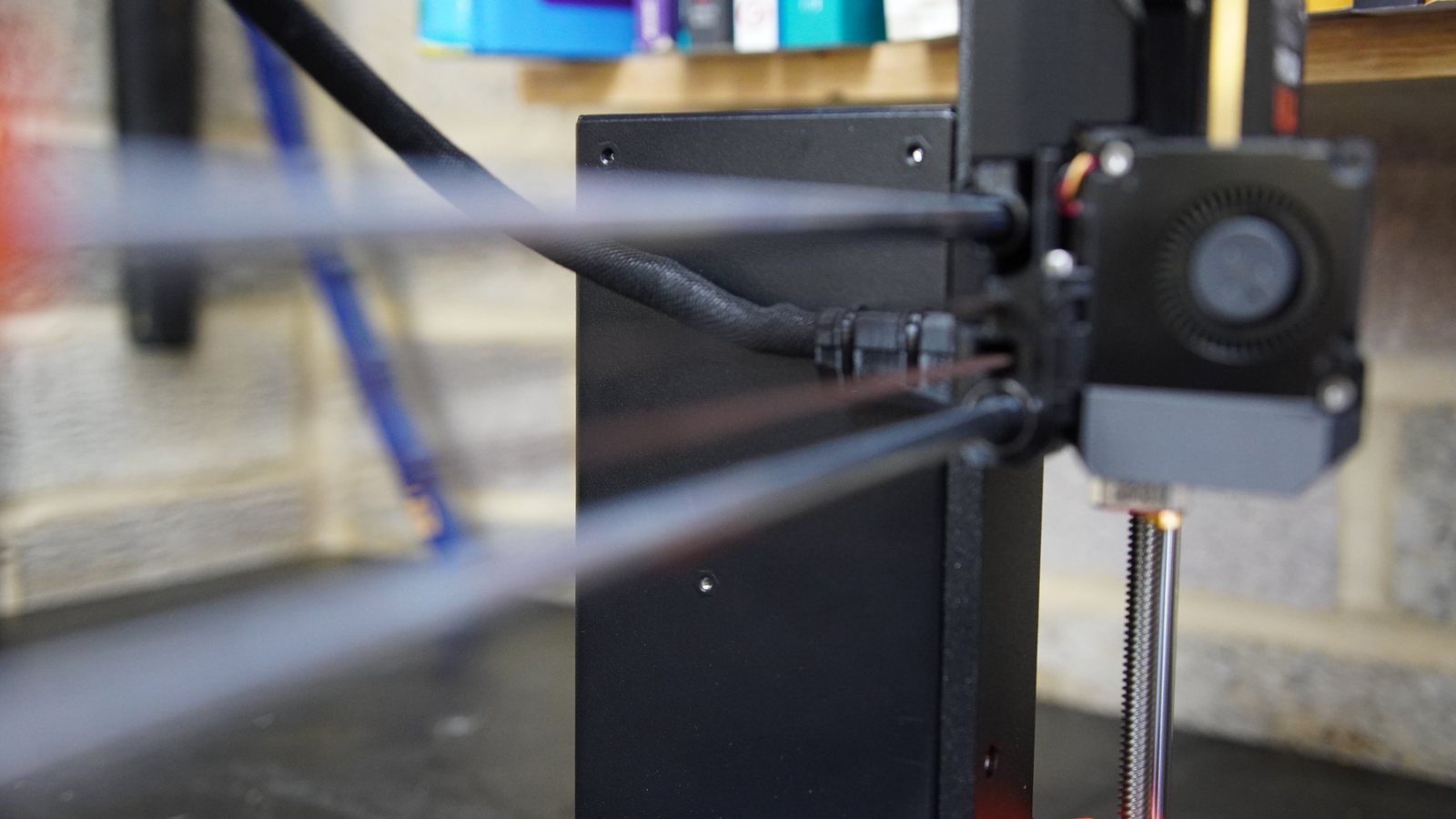 Rear cable exit and cable routing detail on the Prusa MK4.