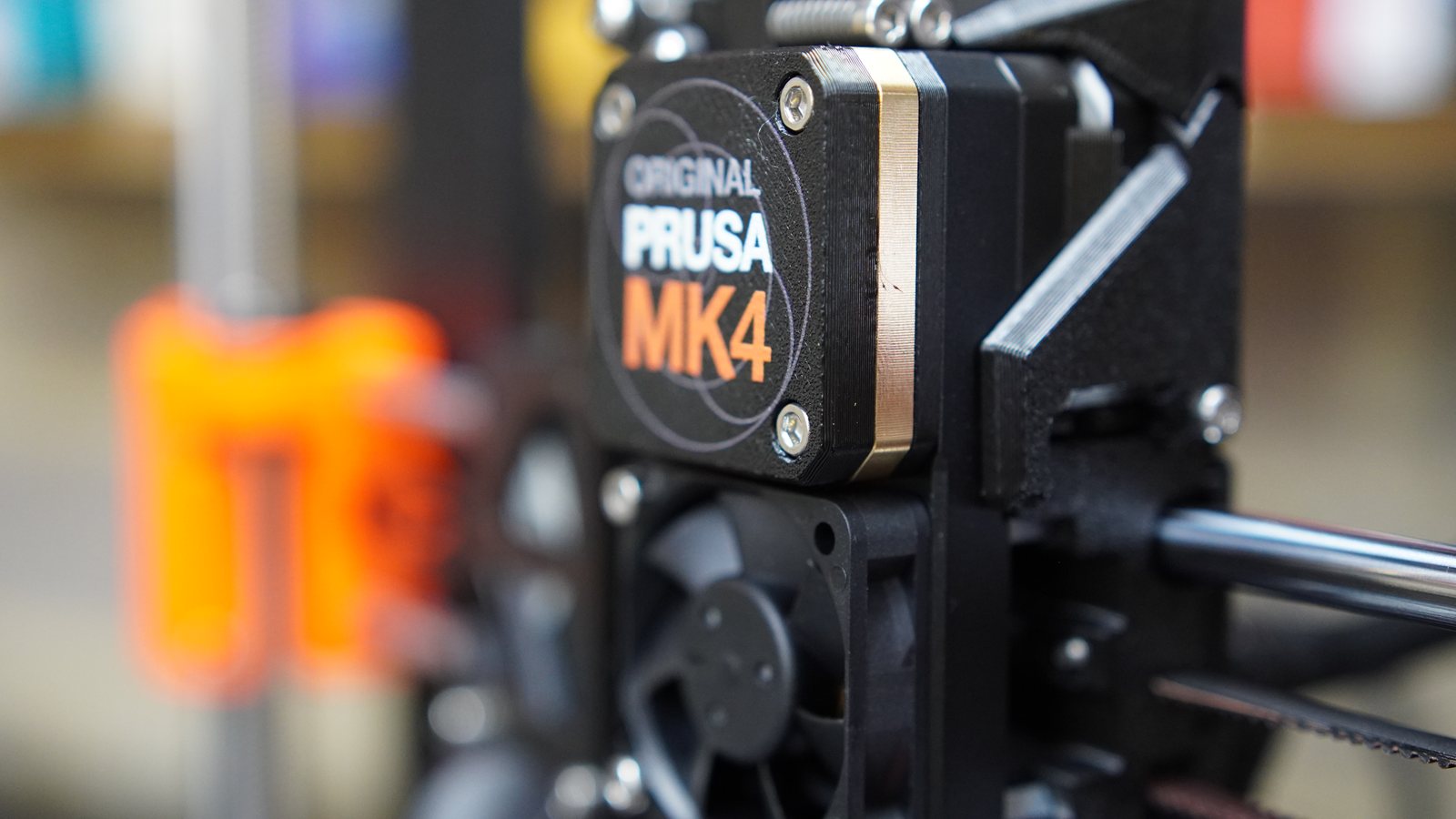 Close-up of the Prusa MK4 toolhead with shallow depth of field.