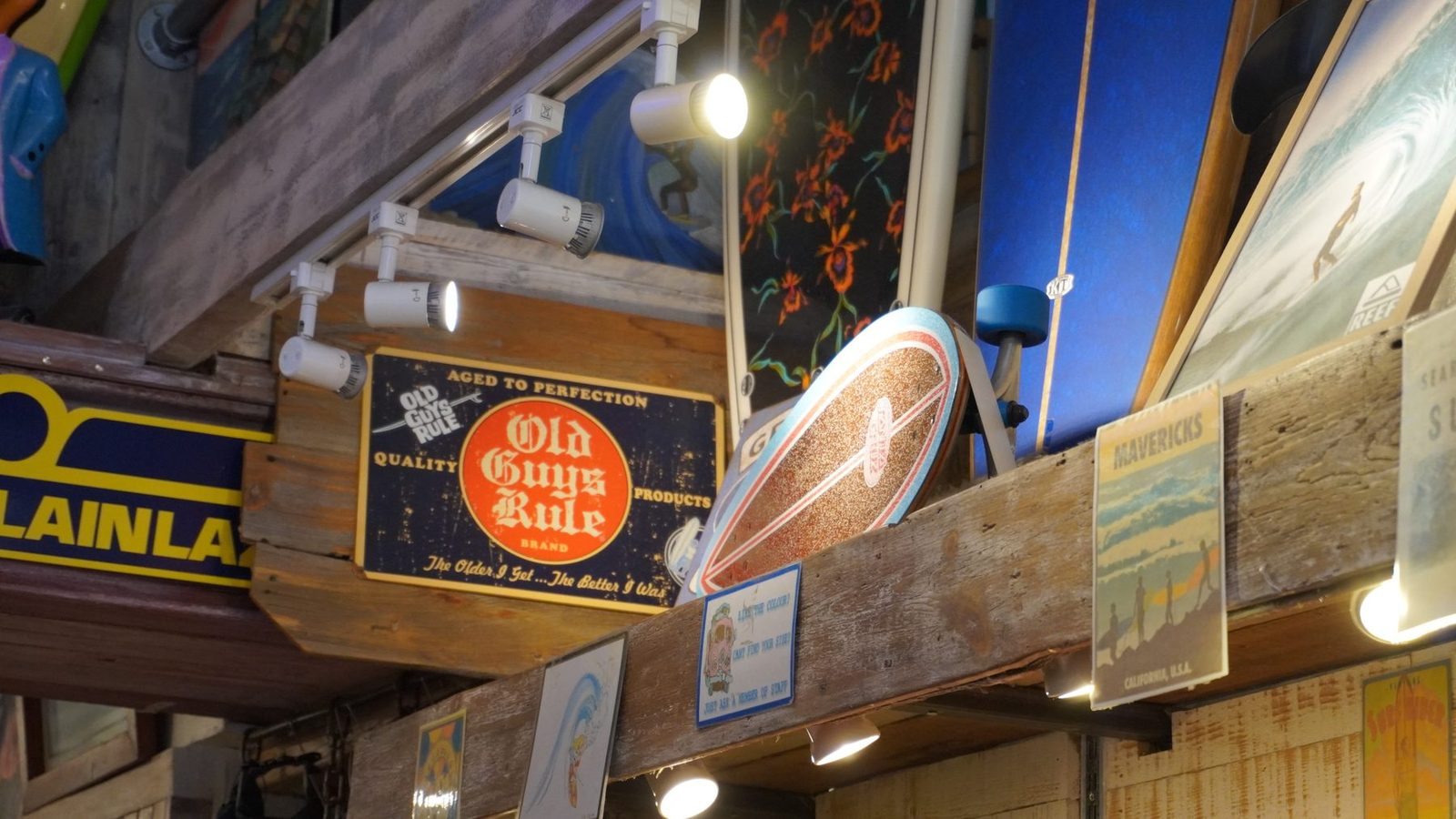 Surf shop board racks and signs.