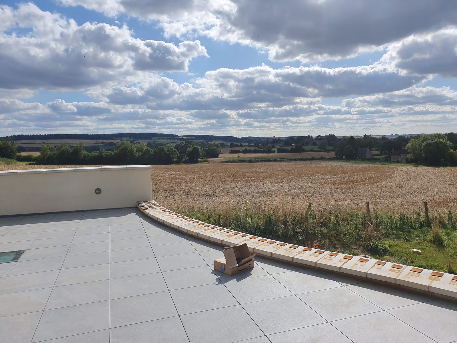 Curved terrace wall before the corten posts were fitted.