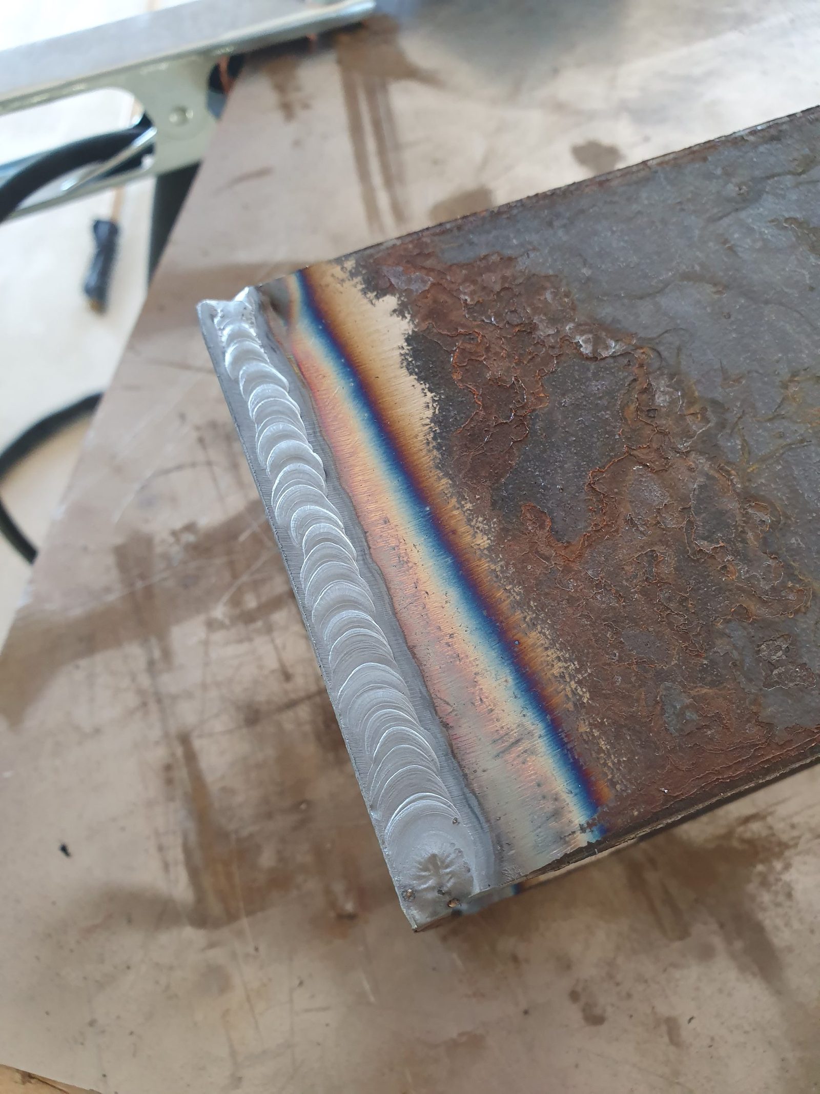 Close-up of a weld on the corten steel box section.