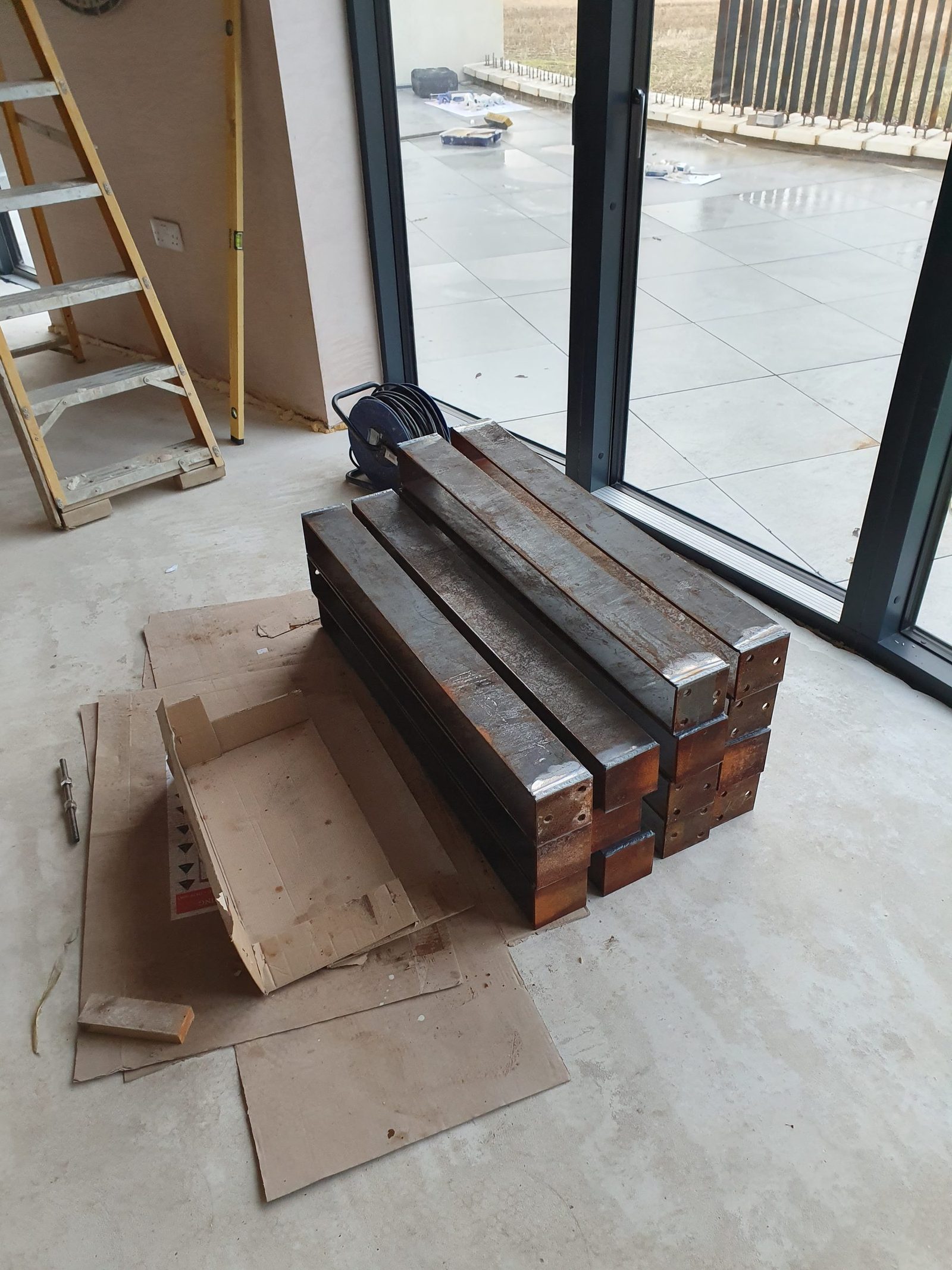 Weathering steel pieces prepared and ready for the balustrade build.