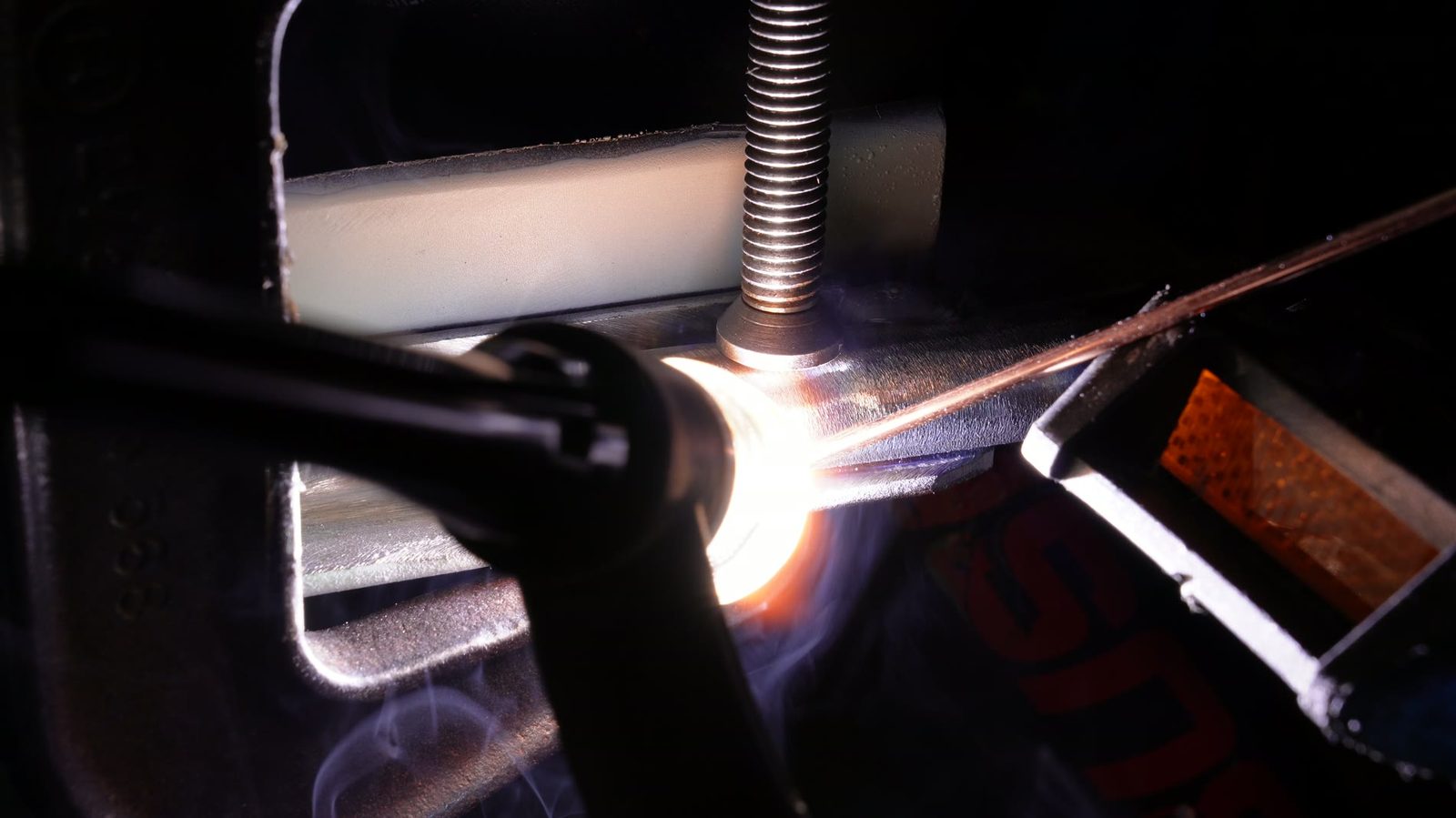Bright welding sparks from the drift trike build.