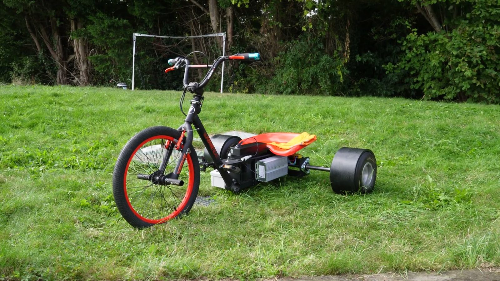 Finished drift trike during a workshop walkaround.