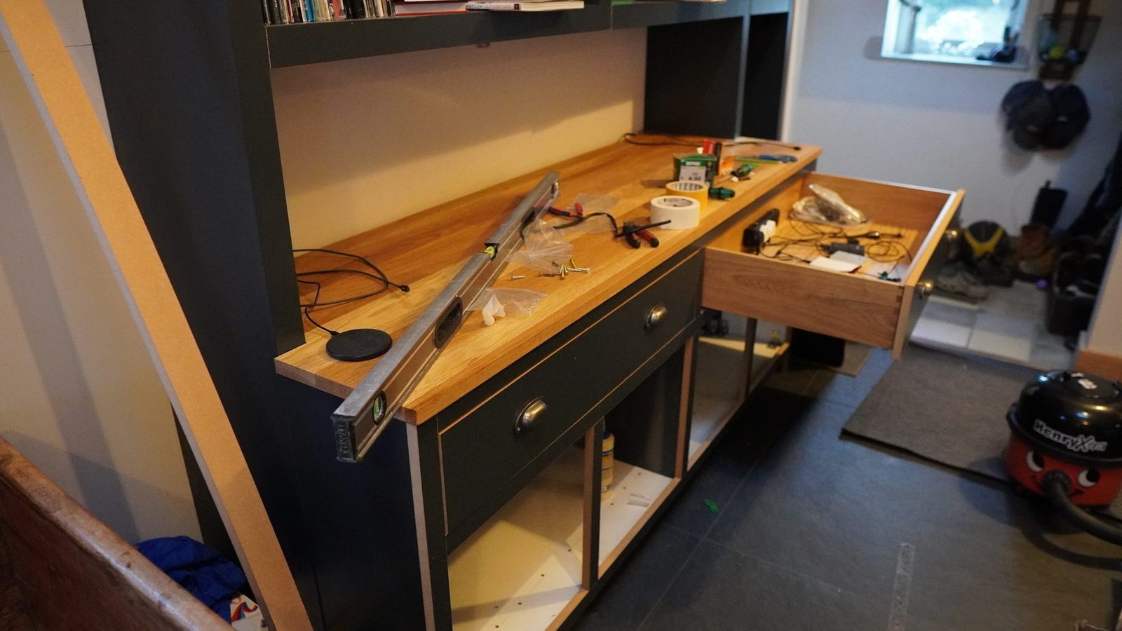 Lower console drawer and wiring area during construction.