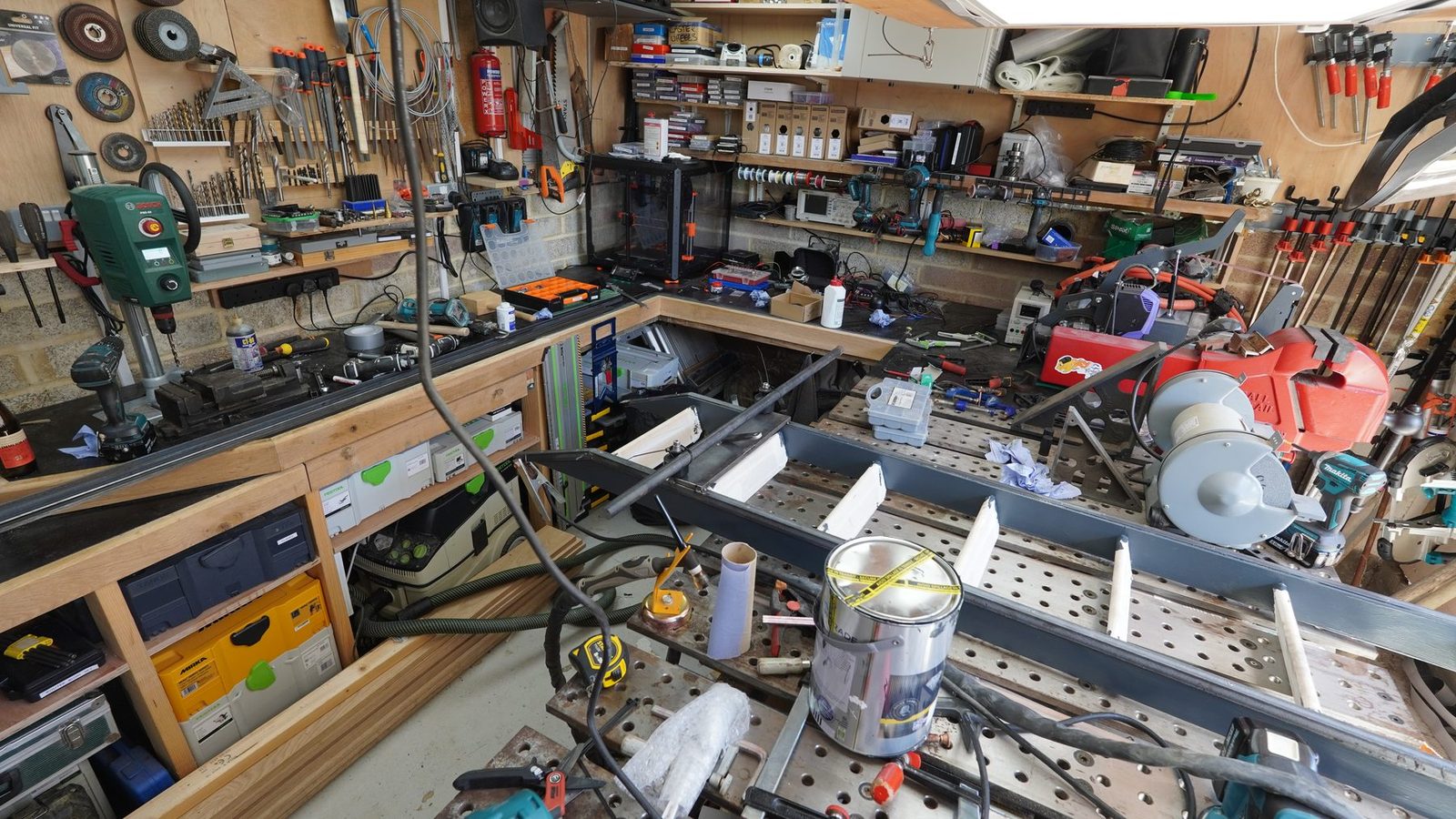 Workshop view of the ladder frame and welding setup.