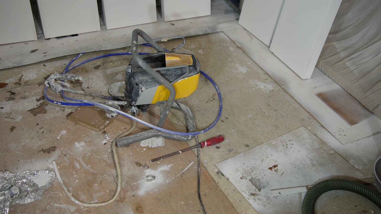 Cables and tools on the floor during the long bookcase build.